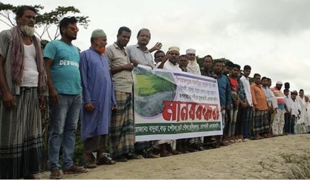 In opposition to the unoccupied invasion of the Canal, Dam, and River, the locals of Mothbaria are forming a human chain.