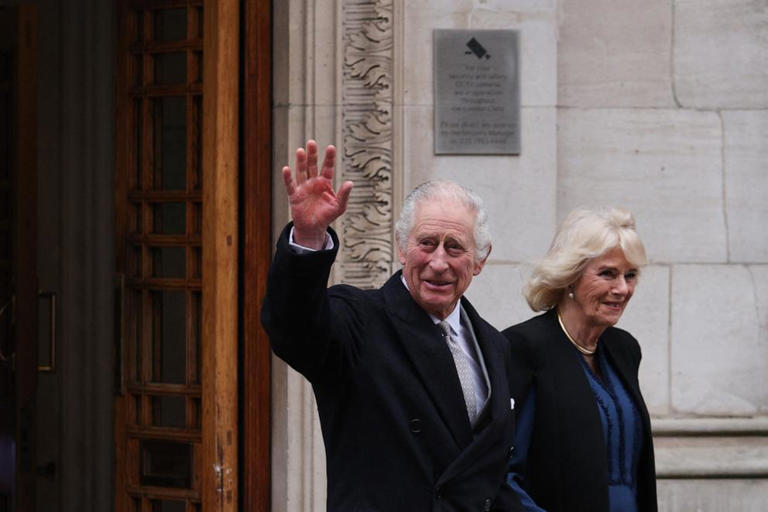 King Charles waves as he leaves, with Queen Camilla, the London Clinic, in London, Jan. 29, 2024. Picture via Getty Images