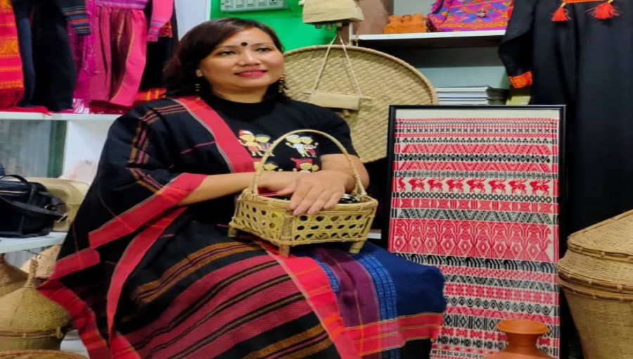 "Paru Chakma, a dedicated educator turned entrepreneur, showcases traditional mountain attire and handicrafts, aiming to promote them globally from her shop 'Chabugi' in Khagrachhari, Bangladesh."
