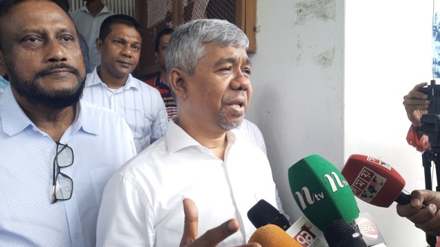 NBR Chairman Md. Abdur Rahman Khan speaks to journalists during a visit to Mongla Customs House, highlighting plans to enhance port efficiency and address field-level challenges.