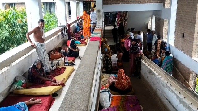Patients occupy the balcony and stairway area at the Upazila Health Complex in Mongla amid rising dengue and chikungunya cases. Photo: V7N