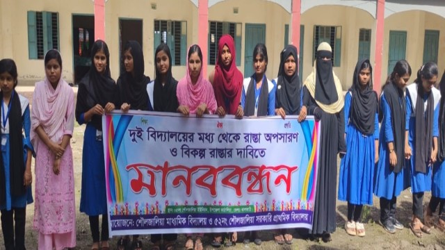 Students, Teachers, & Locals Protest Road Construction Through School Field in Kathalia