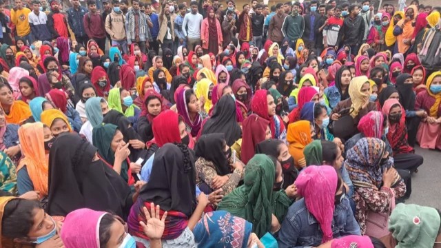 RMG laborers in Gazipur block the Dhaka-Tangail highway in protest of their pay