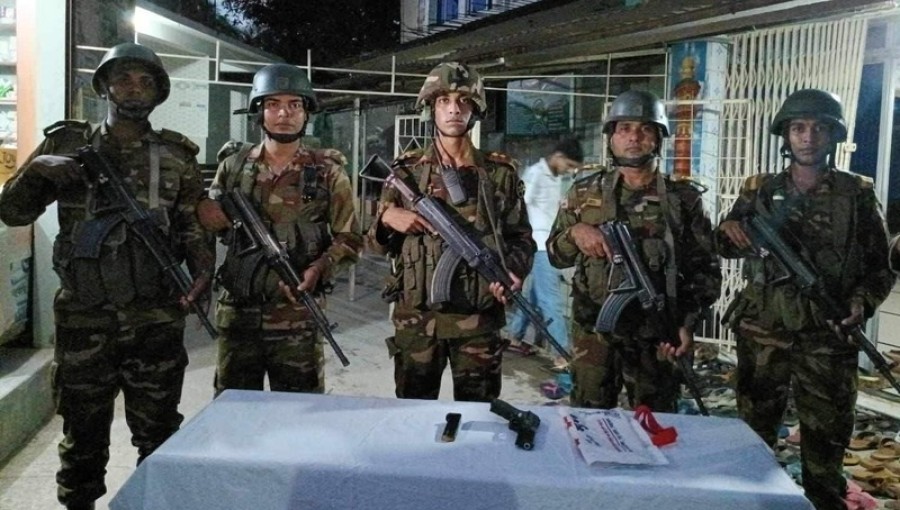 Recovered items from the raid: A 9mm pistol and a magazine found in a mosque in Netrokona's Jalshuka area.