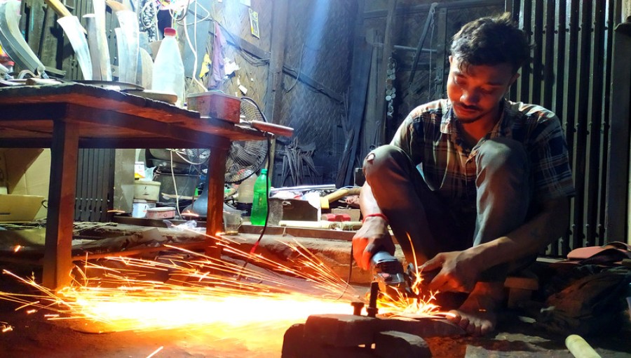 Blacksmiths in Khagrachari are busily crafting and sharpening tools in preparation for Eid al-Adha. Photo: Voice7 News