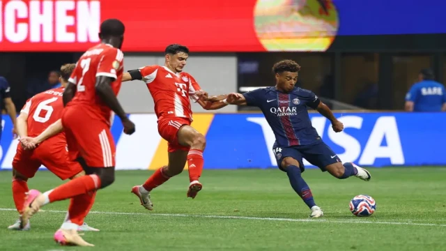 Désiré Doué weaves through Bayern Munich’s defense, displaying his dribbling brilliance during PSG’s hard-fought Club World Cup quarterfinal victory.