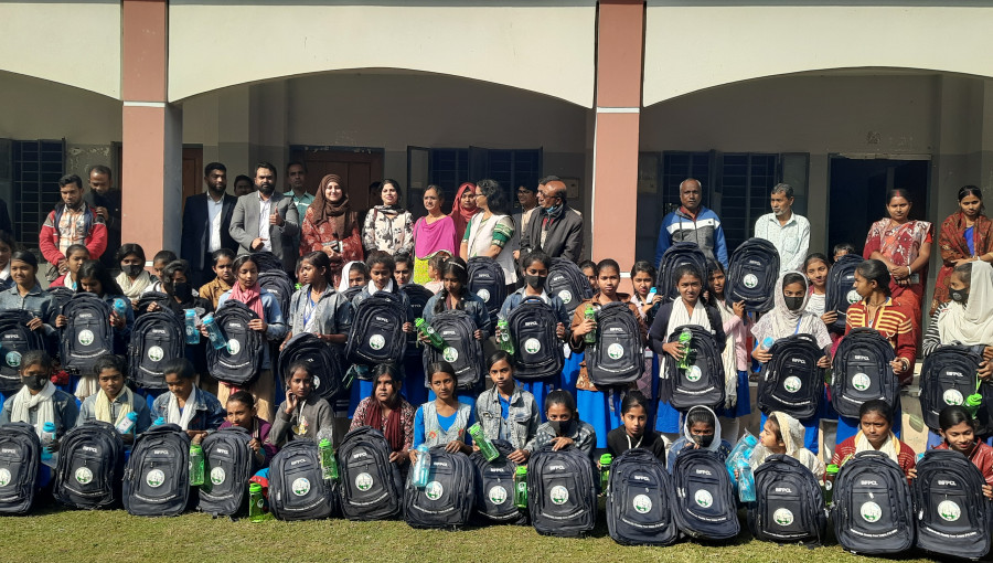 Rampal students receiving school bags and umbrellas from the Thermal Power Plant initiative