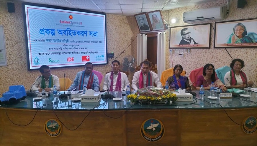Mongsuiprou Chowdhury, Chairman of the Hill District Council, addresses the audience during the introduction of a public health improvement project aimed at enhancing sanitation and waste management in the region. Photo: Voice7 News