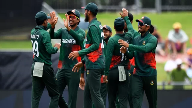 On Saturday, December 23, 2023, in Napier, New Zealand, during their third One Day International cricket encounter, Bangladeshi players celebrate the wicket of Henry Nicholls of New Zealand. (Photospo