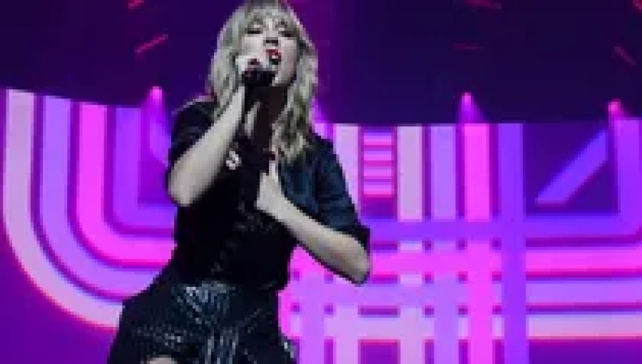 Taylor Swift unveils her exclusive heart-shaped vinyl, 'Lover (Live From Paris),' sparking excitement among fans worldwide.