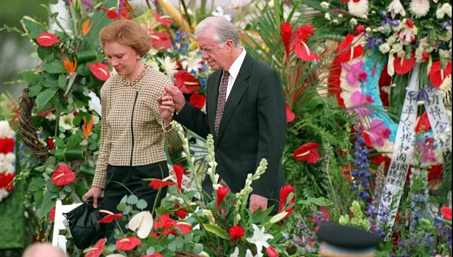 Former President Jimmy Carter and his wife, Rosalynn, attend the funeral of Richard Nixon in Yorba Linda, California, in 1994.