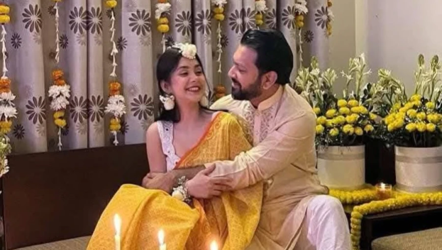 Tahsan Khan shares a heartfelt moment with his rumored fiancée, Roza Ahmed, sparking widespread speculation on social media. The couple's recent photo garnered millions of reactions, with fans and celebrities offering their congratulations.