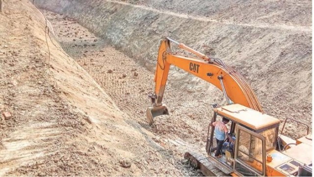 Excavators at work in Ghanshyampur, Godagari Upazila, as canal renovation continues amid allegations of irregular contract awards by BMDA officials.