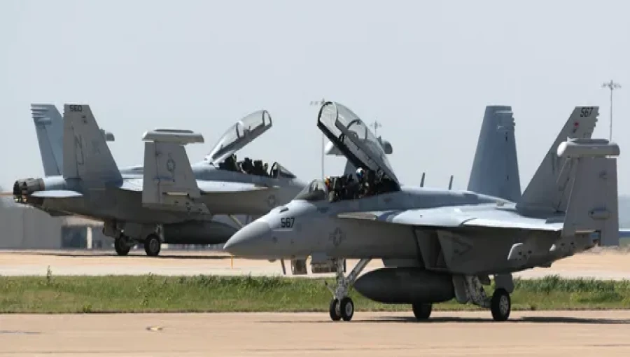 Search teams locate the wreckage of a U.S. Navy EA-18G Growler on a mountainside east of Mount Rainier, as efforts continue to find the two missing crew members following the crash during a routine training flight.