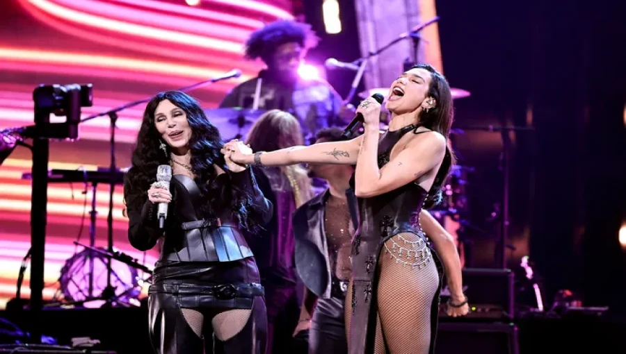 Cher electrifies the stage during the 2024 Rock & Roll Hall of Fame induction ceremony, performing “If I Could Turn Back Time” alongside Dua Lipa, who kicked off the tribute with a cover of “Believe.”