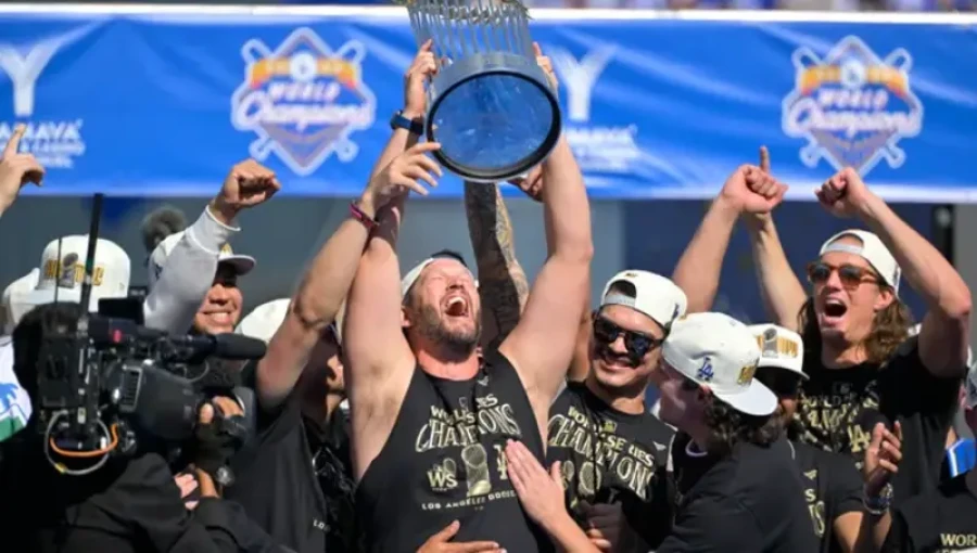 Los Angeles Dodgers fans celebrate their team's first World Series championship in 36 years during a vibrant parade in Downtown L.A., marking a historic moment for the franchise and its dedicated supporters.