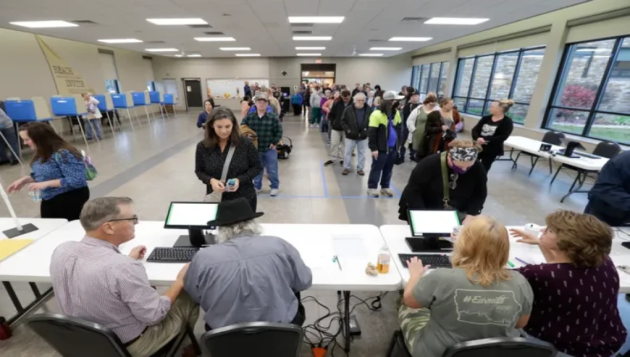 Voters line up at polling stations across the country, casting their ballots in the high-stakes Election Day 2024.