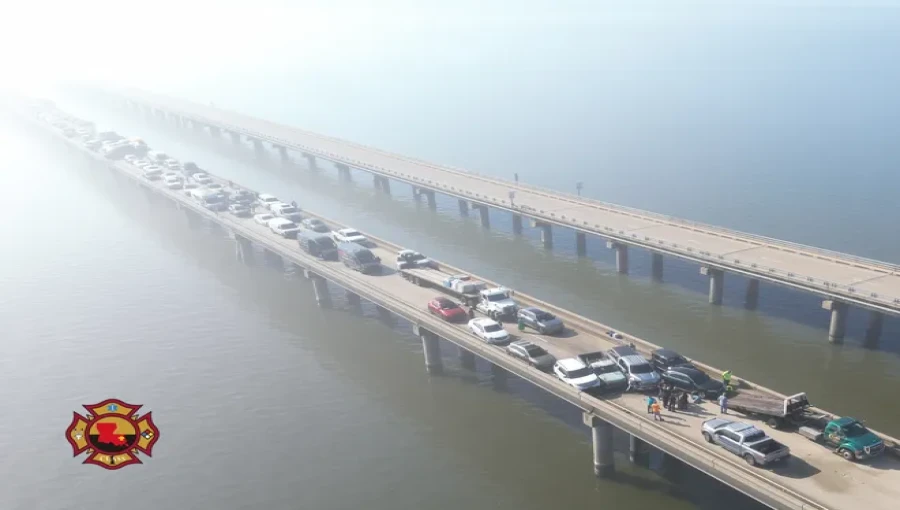 Dozens of cars collide in dense fog on the Lake Pontchartrain Causeway Bridge near New Orleans, causing major traffic delays.