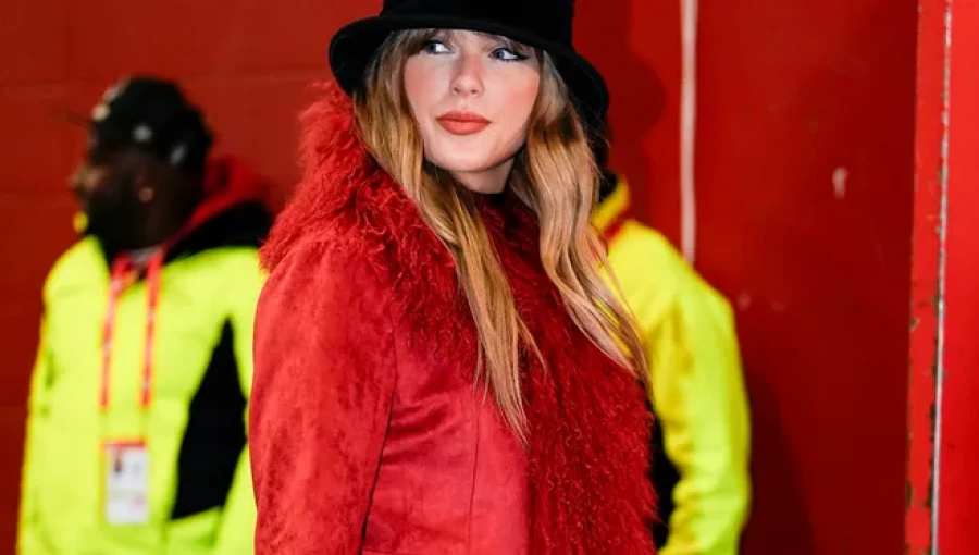 Taylor Swift cheers for the Chiefs at Arrowhead Stadium, supporting her boyfriend Travis Kelce during their game against the Houston Texans.