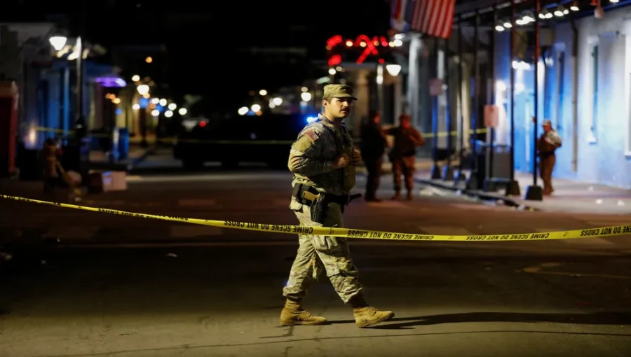 "Scene of devastation on Bourbon Street, New Orleans, after a pick-up truck plows into crowds celebrating New Year's Eve, leaving 15 dead and dozens injured. Authorities are investigating a possible ISIS link."