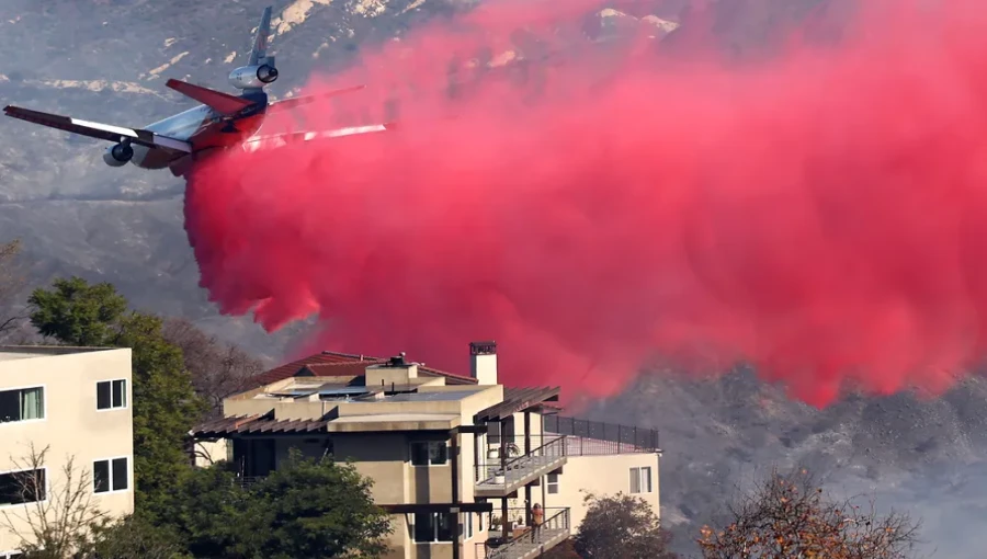 Bright red fire retardant, Phos-Chek, deployed across Southern California to combat wildfires, raising questions about its composition and environmental impact.