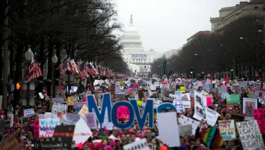 Protestors prepare for the People’s March in Washington, D.C., ahead of Donald Trump’s second inauguration, as liberal groups gather to advocate for abortion rights, climate change action, and more.