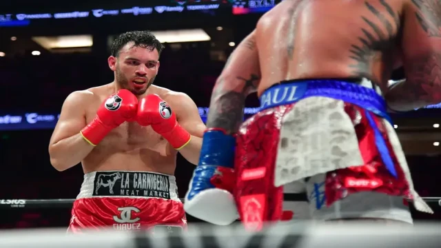 Jake Paul and Julio César Chávez Jr. lock eyes across the canvas as tension builds for their June 28, 2025 main event at Honda Center.