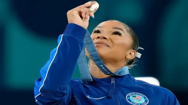 Jordan Chiles during her floor routine at the 2024 Paris Olympics, where a controversial scoring decision cost her a bronze medal.