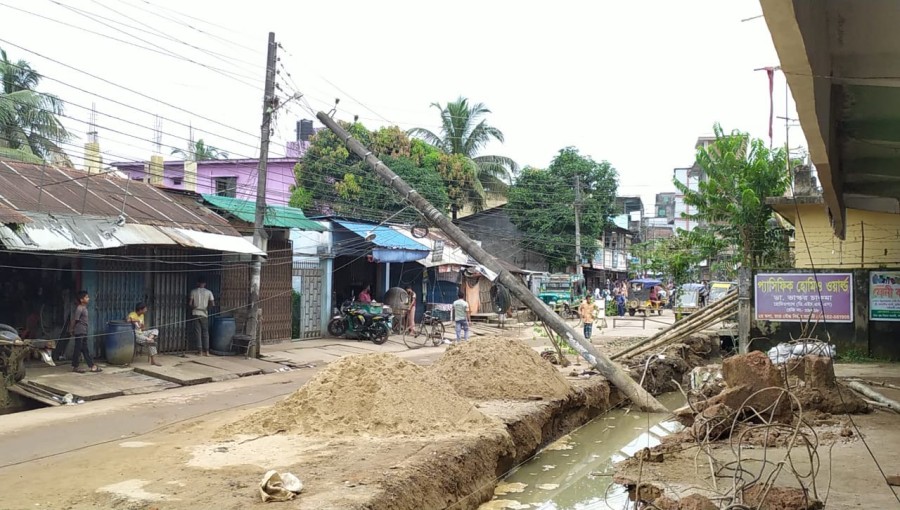 Khagrachari Drain Project Causes Electric Pole Tilt, Public Safety at Risk