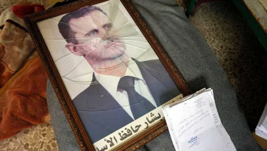 Syrian President Bashar al-Assad Flees as Rebels Declare Syria "Free"