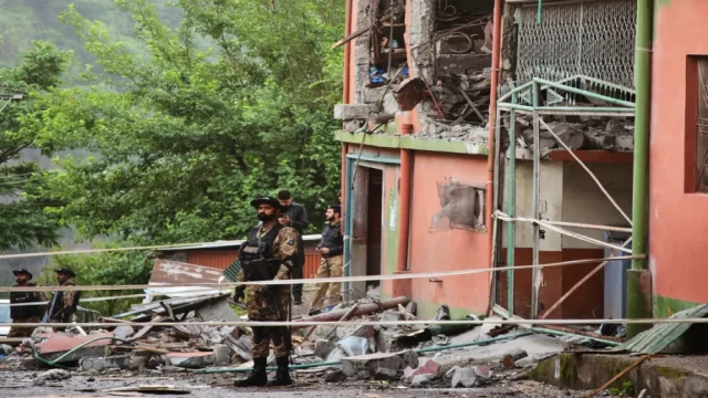 “Pakistani emergency responders tend to the injured after cross-border shelling allegedly carried out by Indian forces in Azad Kashmir. At least 31 have been confirmed dead.”
