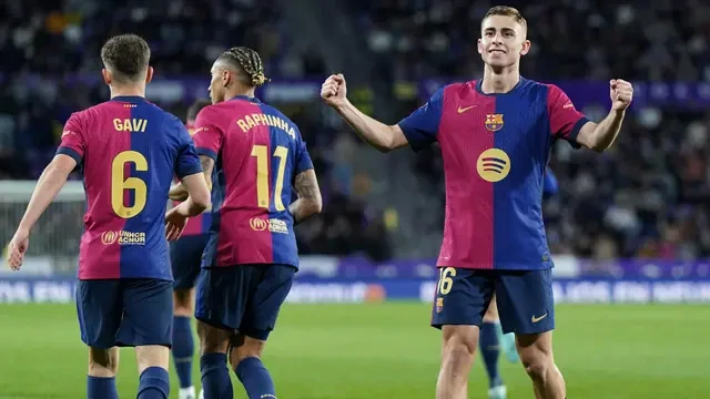 Raphinha celebrates after scoring Barcelona’s equalizer in the second half against Real Valladolid.