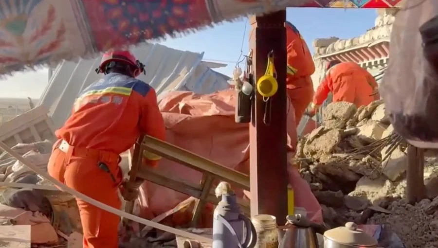 "Rescue workers search through rubble in Tibet after a powerful earthquake, with the death toll rising to 126."