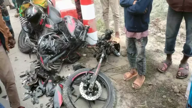 The twisted accident bike is lying on the road side