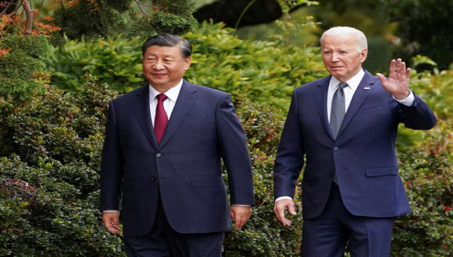 Xi and Biden shake hands, signaling cooperation amid looming uncertainty