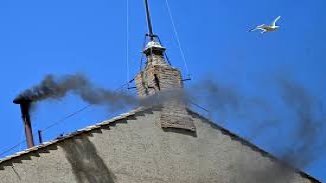 Black smoke rises from the Sistine Chapel for the second time, signaling no pope elected.