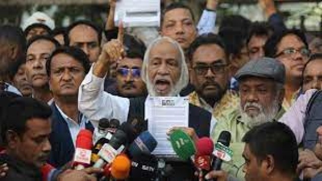 BNP leaflet distributing pamphlets in front of the Jatiya Press Club, the speake discussed democracy in Bangladesh in an interview with reporters