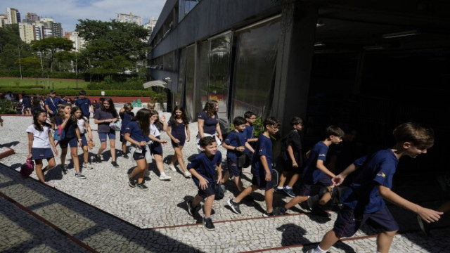 Students at the Reverend Martin Luther King public school in Rio de Janeiro enjoy vibrant break times, playing and interacting without the distraction of smartphones