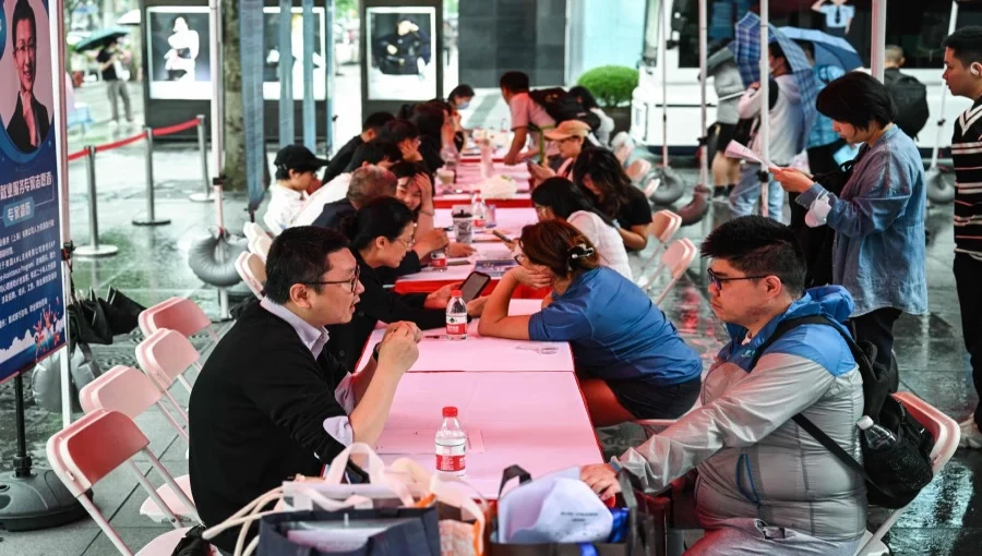 Empty Booths, High Stakes: Shanghai Job Fair Reflects China's Youth Unemployment Woes