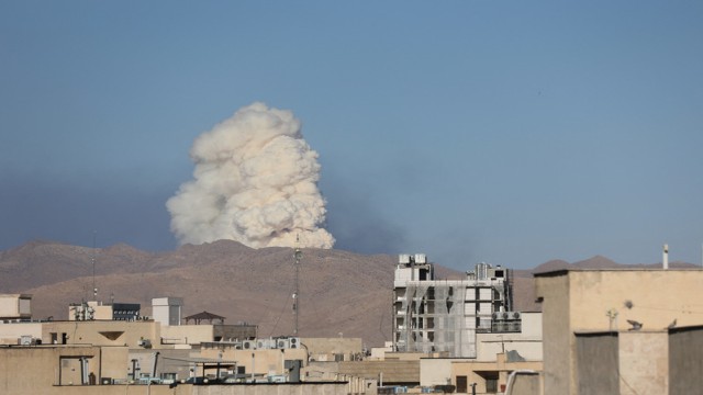 “Smoke rises over an Iranian city following airstrikes carried out by Israeli and U.S. forces, as tensions escalate across the Middle East. (Photo: Reuters)”