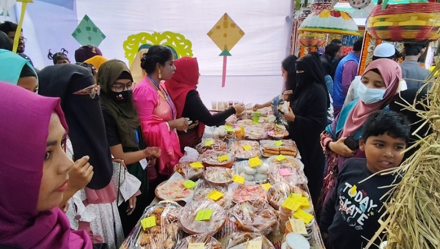 Students and teachers participate in the Pitha Festival and Cultural Program at Dharmarai Government College on January 30, 2025. The event featured a variety of traditional Bengali pithas and cultural performances.