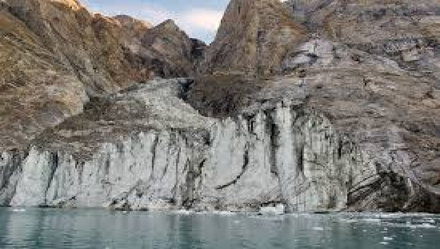 A massive landslide in Greenland, triggered by glacial melting, sent over 25 million cubic meters of debris into a fjord, creating a tsunami and seismic waves detected worldwide—an alarming sign of climate change's accelerating impact.