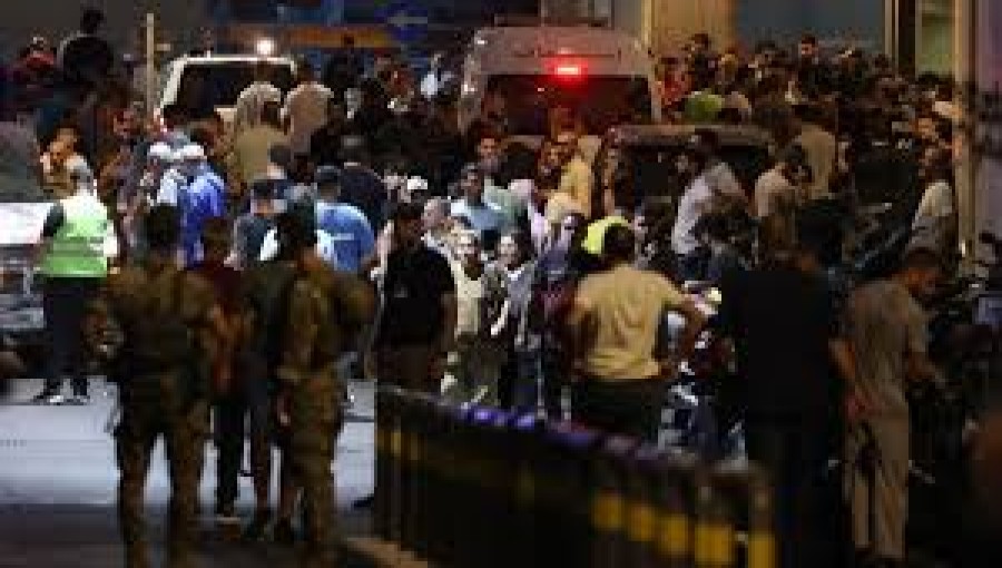 Rescue teams respond to a blast site in Beirut after deadly explosions targeting Hezbollah strongholds, leaving 20 dead and hundreds injured.