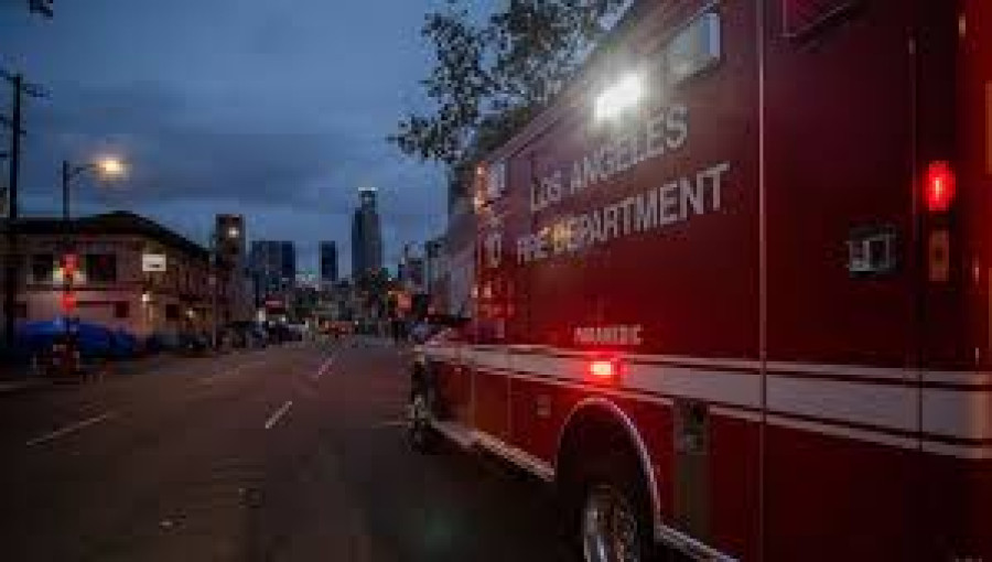 Emergency responders from the Los Angeles Fire Department assess students at Walter Reed Middle School after 17 students became ill from consuming a banned substance. The incident prompted an investigation by the Los Angeles School Police Department. Photo: US Today