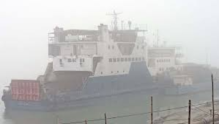 Vehicles are stranded at the Daulatdia Ferry Terminal as dense fog halts ferry services on the Daulatdia-Paturia route, causing inconvenience for drivers and passengers.