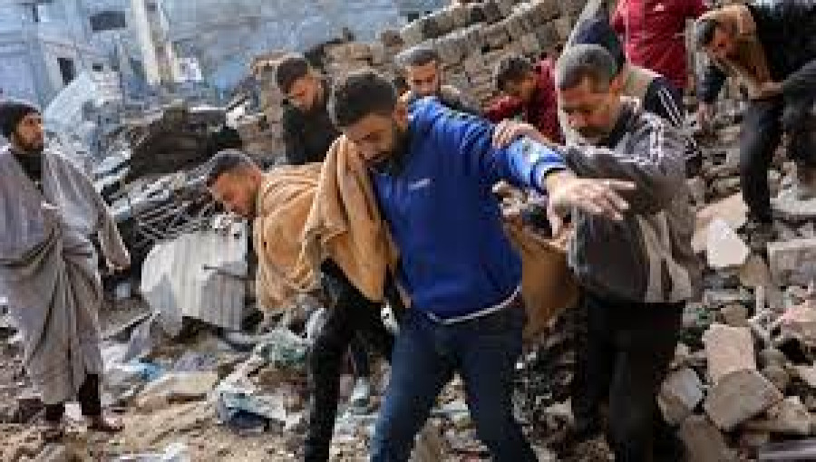 Rescue workers sift through the rubble of the Al-Ghoul family home in Gaza City after an Israeli airstrike killed 17 civilians, including women and children, amid ongoing ceasefire negotiations.