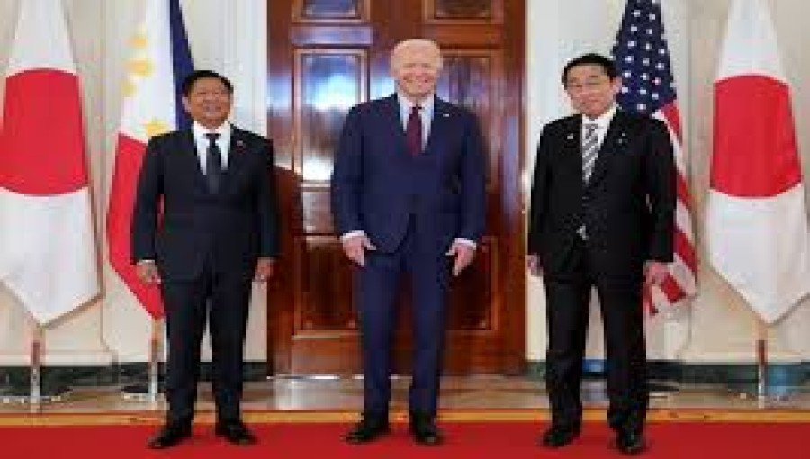 Tensions mount China rise, Biden pledges a "ironclad" defence of Philippines & Japan