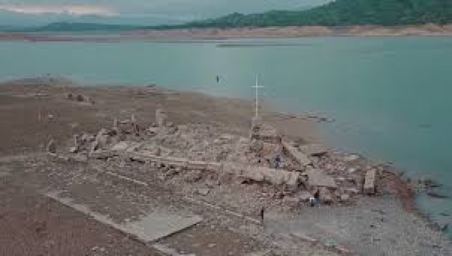 Drought causes Philippine hamlet that was drowned dam to reemerge