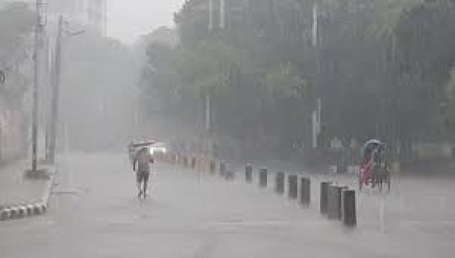 A family wades through floodwater in South Surma, Sylhet, as heavy rainfall continues to impact the region. The Meteorological Department has forecasted more heavy rain, raising concerns of worsening flood conditions.