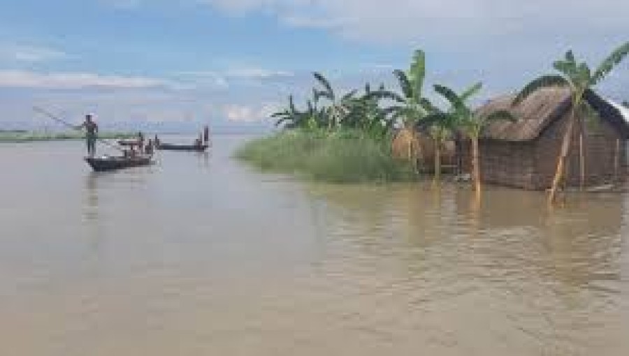 Floodwaters inundate village in Tangail district, washing away roads and submerging homes, as the local administration steps in to assist affected residents.